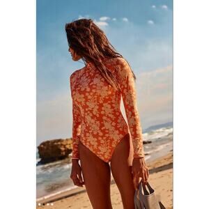 New FREE PEOPLE Rhythm Serene Long Sleeve One-Piece Swimsuit $110 SMALL Orange